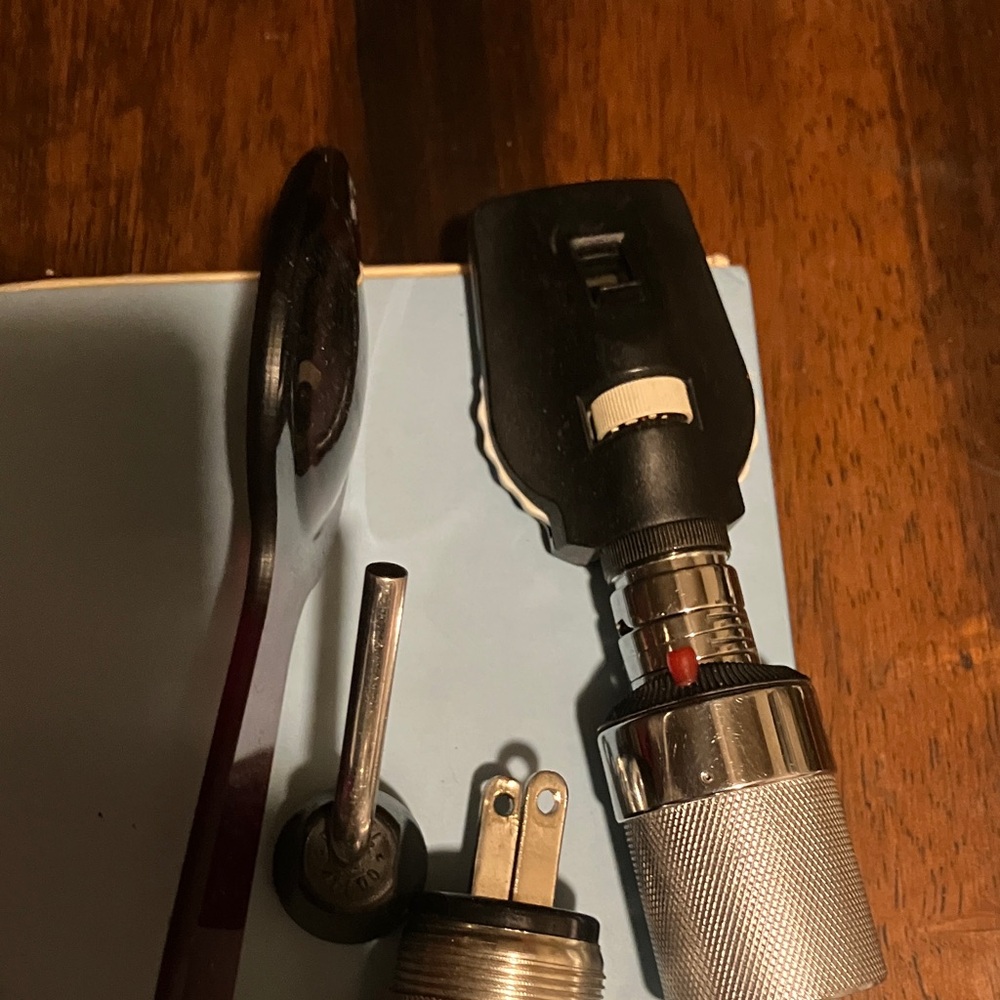 Silver Otoscope Handle with Maroon eye cover:during exam Medical Examination Set